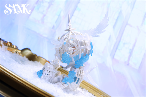 Good Night Series - Sky Wing: A steampunk art toy with a cage-like orb, spire, wing motifs, and blue crystals, set on faux snow. Limited edition collectible.