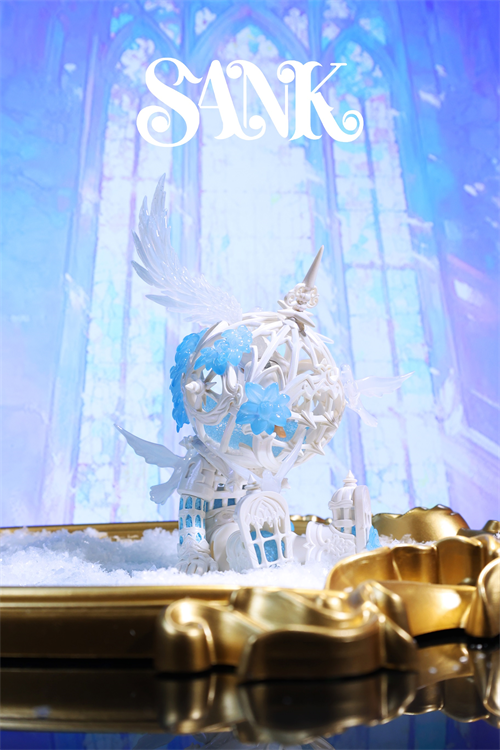Good Night Series - Sky Wing collectible featuring a white lattice sphere with blue flowers, wings, on a snowy base in a gilded tray. Preorder now.