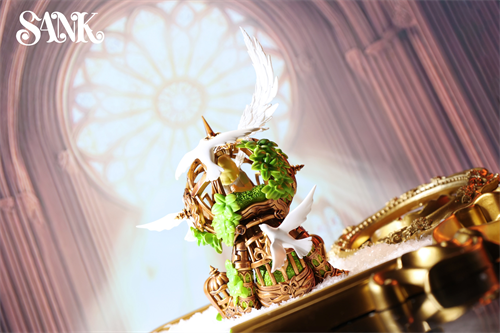 Good Night Series - Sky Wing: Ornate brass-toned sculpture with foliage and white wings, set against a stained-glass window. Preorder, limited edition of 199 sets.