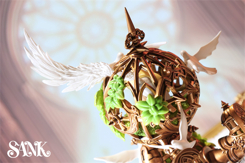Good Night Series - Sky Wing: Steampunk-style ornamental sphere with filigreed metal, wings, bird figures, and succulent motifs. Preorder, limited edition collectible from Strangecat Toys.
