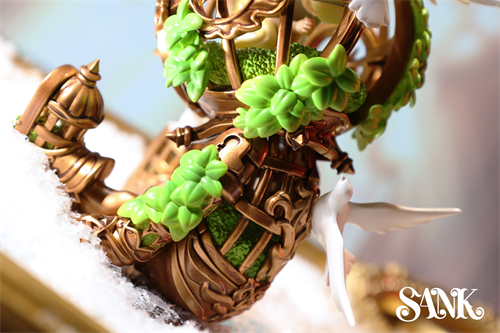 Good Night Series - Sky Wing: An ornate gold mechanical sculpture with green moss, doves, and frost-like base, by SANK. Limited edition collectible.