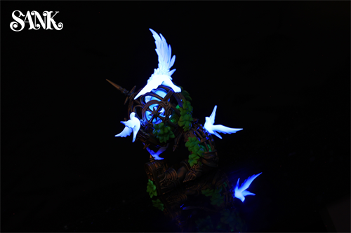 Good Night Series - Sky Wing: A bronze-toned sculptural lamp featuring glowing bird silhouettes on a vine-wrapped cage, limited edition resin art piece.