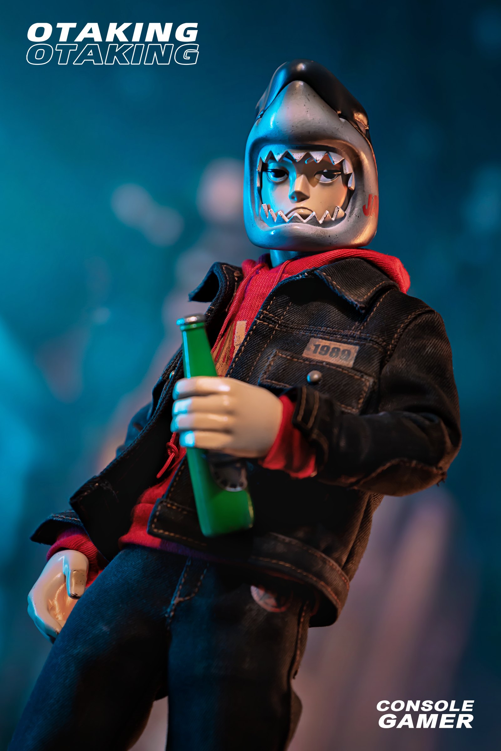 A toy figure holding a bottle, part of OTAKING - Console Gamer set with arcade head screen and various accessories.