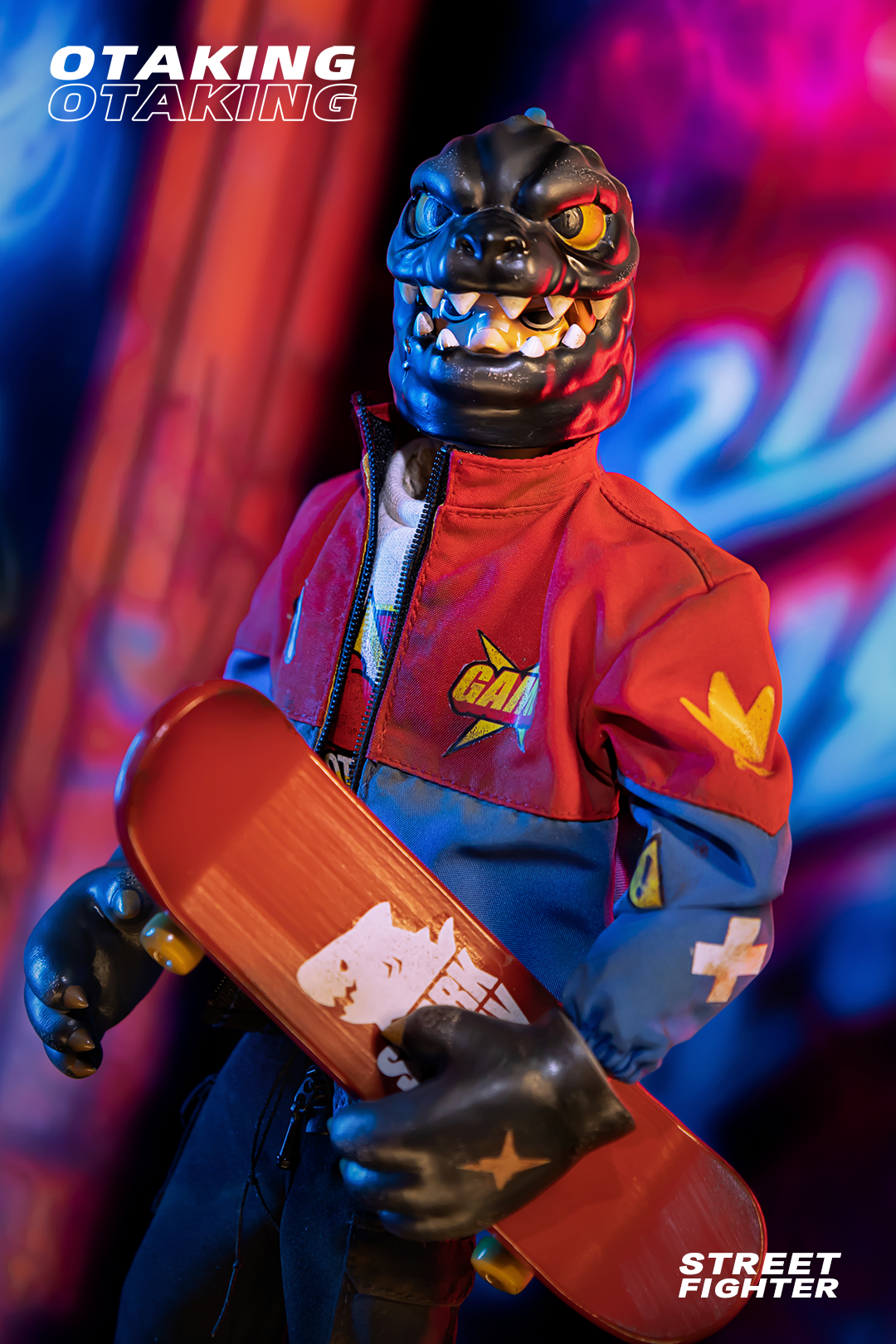 Toy figure holding a skateboard, close-up of logo and bird's arm from OTAKING - Street Fighter product image.