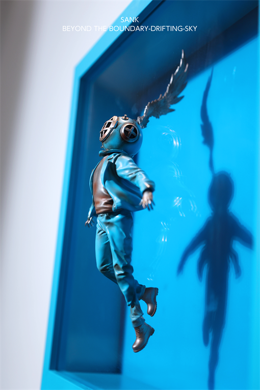 Sank-Beyond the Boundary-Drifting-Sky diorama: stylized figure in diving helmet with wing, in blue frame. Resin collectible, open edition, preorder for 2026.