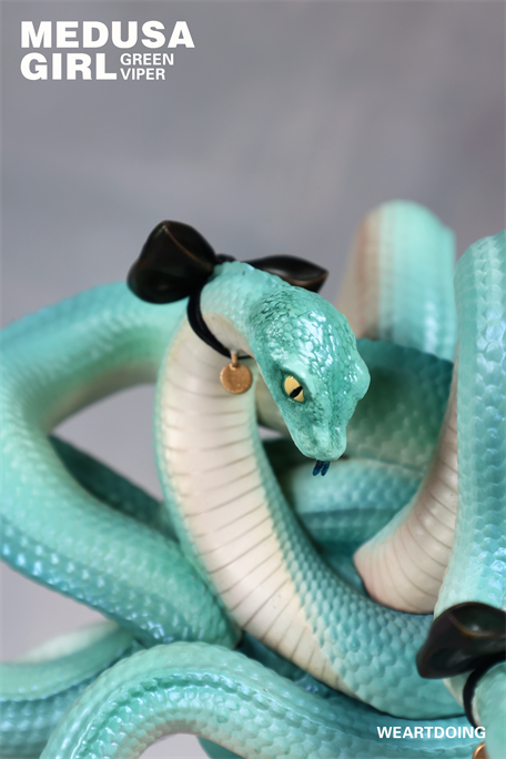 Stylized resin art piece Medusa Girl-Green Viper with mint-green snake, black bow, and gold charm. Preorder limited edition, 499 sets.
