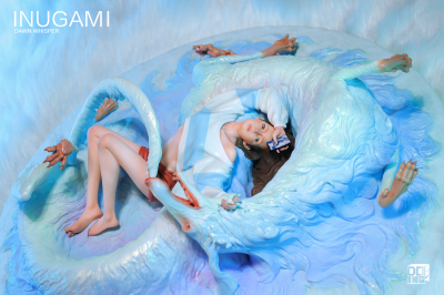 INUGAMI-Dawn Whisper by PHUC DANG: Young woman in a cloud-like creature, holding a smartphone. Preorder limited edition art toy, ships June 2026.