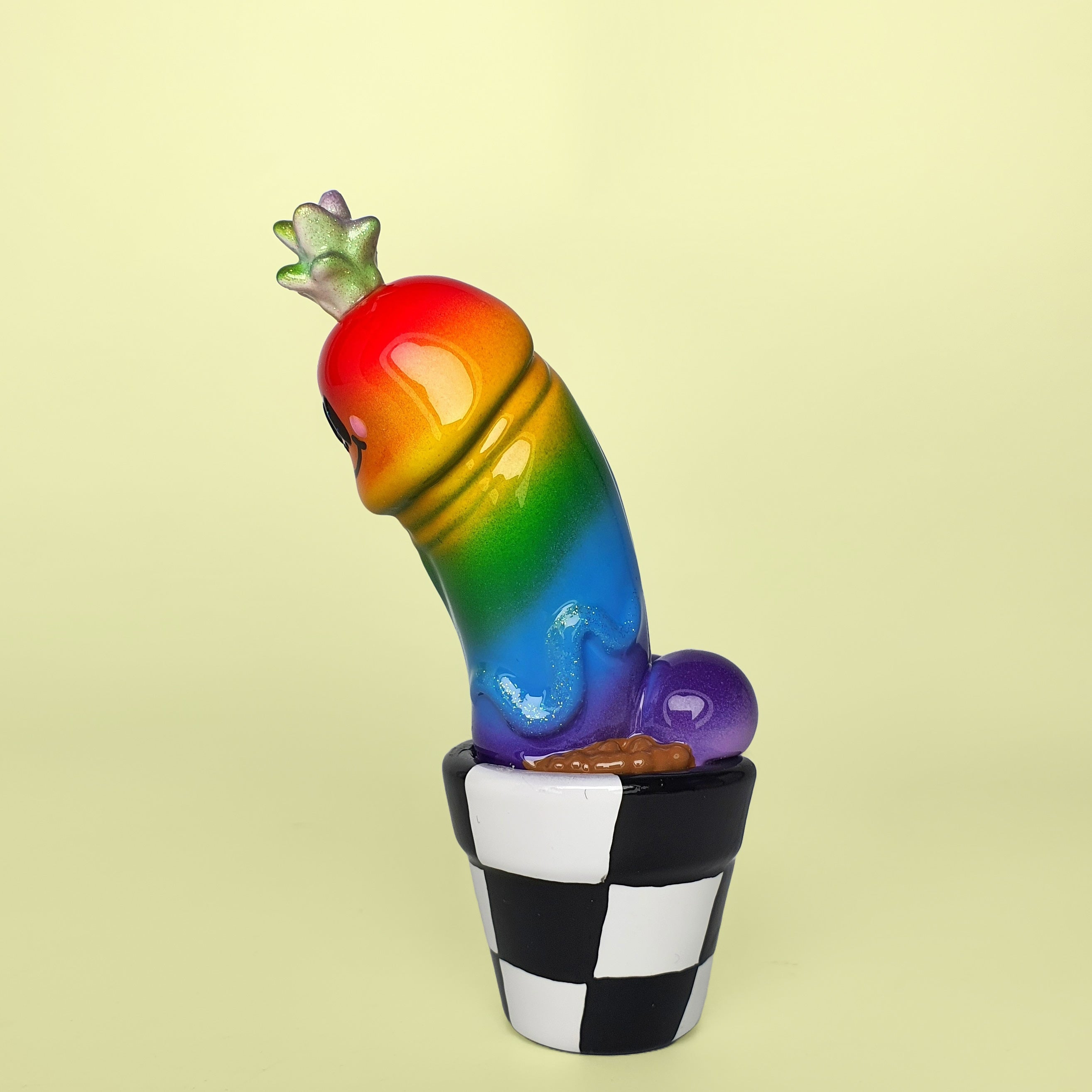 Mixed media toy sculpture of a rainbow worm in a pot by Simon Says Macy & Friends - Rainbow by Kik.