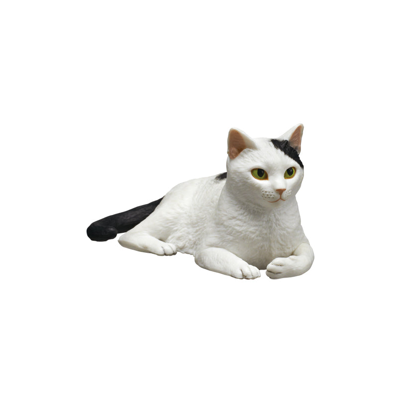 AIP Moriguchi Osamu's Cat Figure Mascot 3 Gacha, featuring a white cat with a black tail and patch, front paws tucked under.