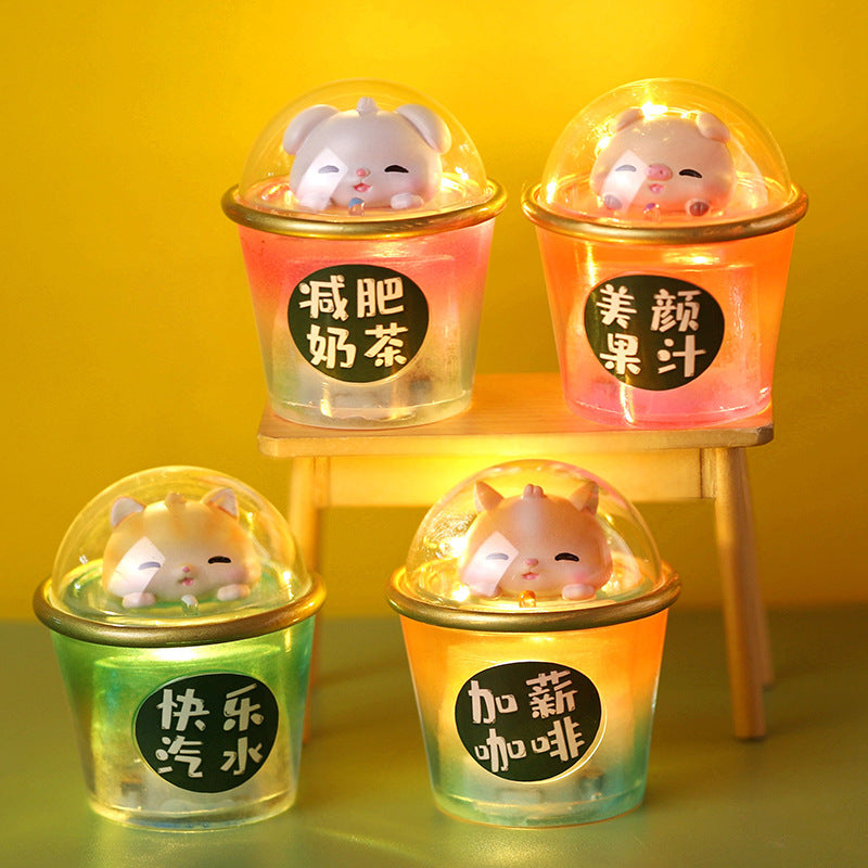Xiamen & Ding-Tonna Super Limited Tons Cup Blind Box Series: small plastic animals and toys in cups, one in a bubble.