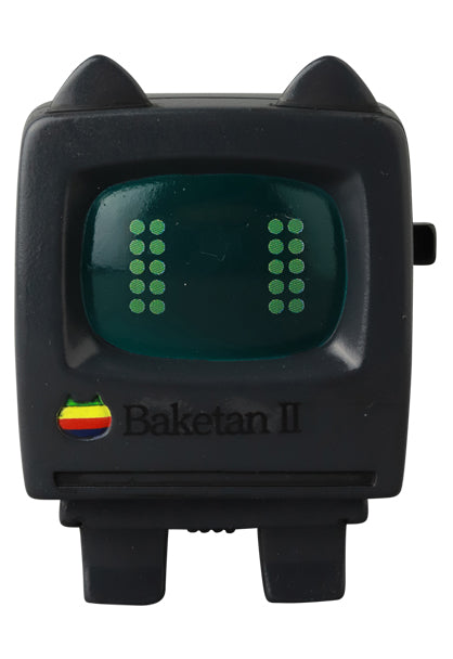 VAG Series 44 Baketan No. 2: A 2.5-inch black vinyl gadget with vintage Apple logo, featuring a greenish LED dot-matrix display.