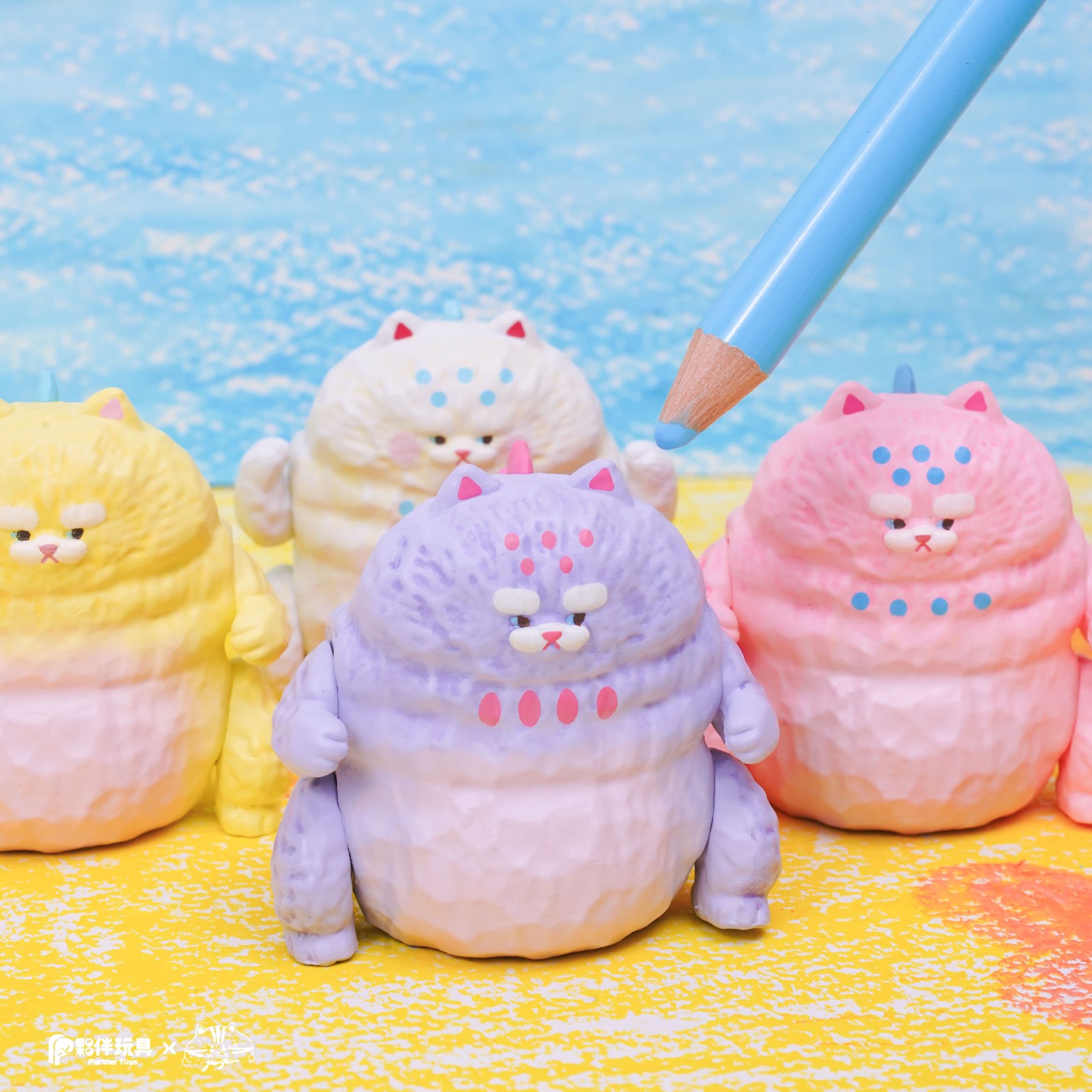 HanHanzoo - HanHan Dragon Blind Box: Four textured, pastel cat-like figures with grumpy faces, highlighting collectible designer toys from Strangecat Toys' art toy collection.