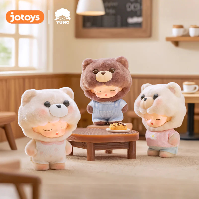 YUMO Cute Pet Family Mini Series: Three figures in bear-head hoods, posed around a wooden table in a miniature café setting.