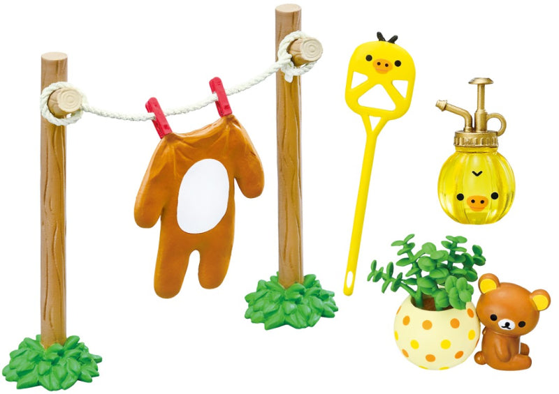 Rilakkuma room Re-ment Blind Box Series toys, featuring six unique designs, displayed with a potted plant, emphasizing collectible art toys from Strangecat Toys.