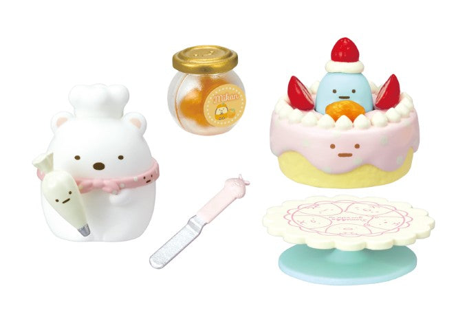 Sumikkogurashi Sweets Cooking Together Re-ment Blind Box Series features a toy baking set with a chef bear, penguin cake, and accessories for imaginative play.