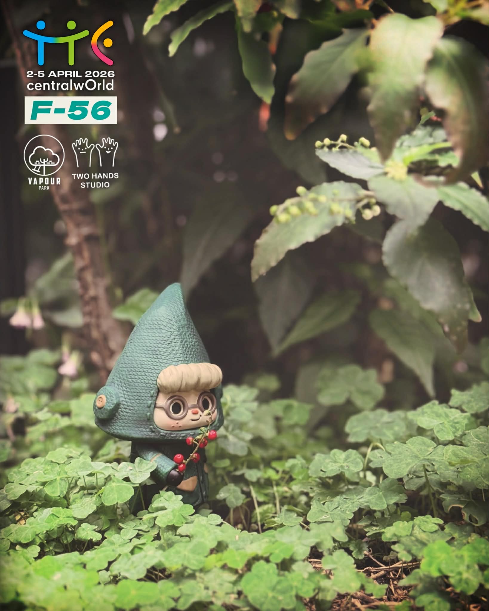 TWO HANDS Studio - Green Elf: JADE vinyl art toy, a forest sprite figure with a green hood and red berries, featured for preorder at CentralWorld event.