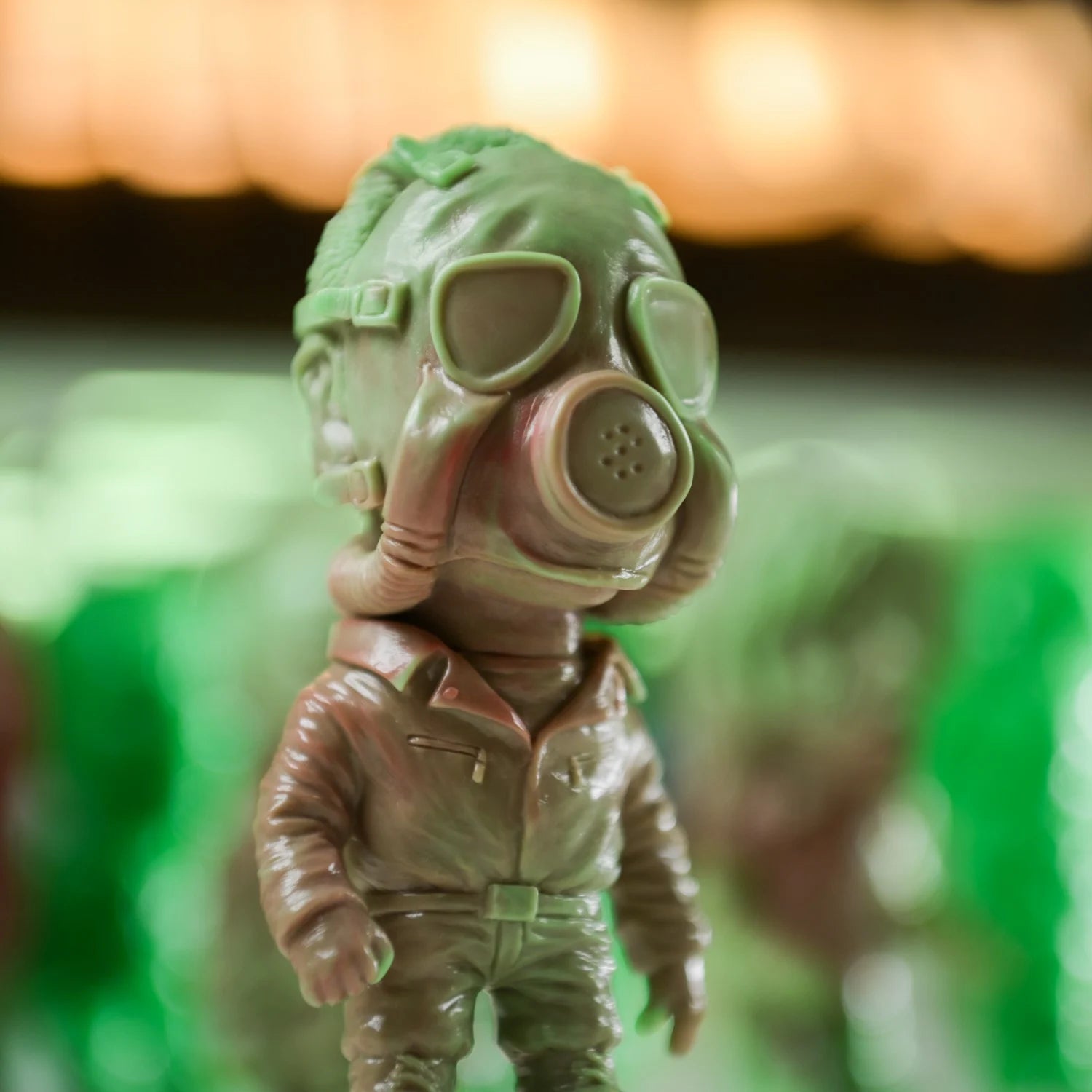 ZOMBI: DAWN OF THE DEAD Who Goes There Blind Box Series figure in a gas mask and jumpsuit, showcasing detailed craftsmanship from the iconic film.