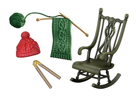 Grandma's sewing room Re-ment Blind Box Series features a green yarn ball, wooden knitting needles, a red beanie, and a wooden ruler on a rocking chair.