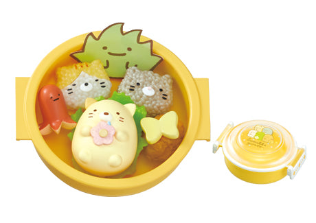 Sumikko Bento Re-ment Blind Box Series: a character-themed bento with rice animal faces, octopus sausage, broccoli, fish-cake, and decorative elements in a yellow container.