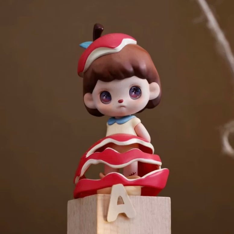 ANMOO Amo World is a Lie Fairy Tale Blind Box Series figurine featuring a girl in a red dress, part of a collectible preorder set.