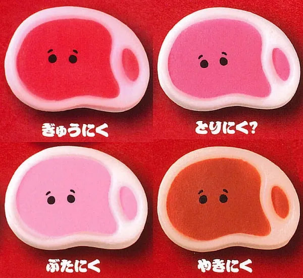 Just Meat-kun Gacha Series: Four cartoon-style sweet confections resembling beef, chicken, pork, and grilled meat, each with eyes and Japanese labels, offered as a random gacha.