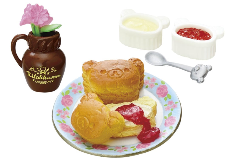 Rilakkuma Longing British Tea Time Re-ment Blind Box Series featuring pastries, a teddy bear-shaped bun, and a plant in a ceramic mug.