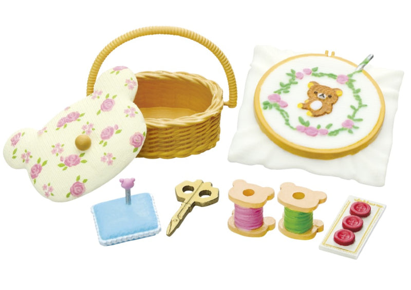 Rilakkuma Longing British Tea Time Re-ment Blind Box Series featuring a sewing kit with basket and teddy bear, highlighting collectible designs.