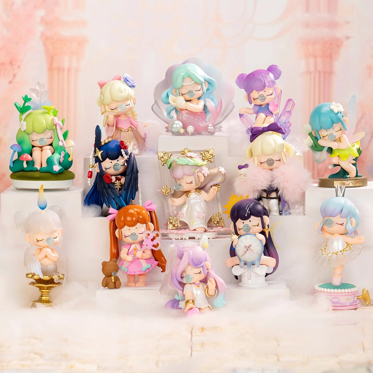 Nanci's Museum of Fantasy Blind Box Series: whimsical pastel figurines of dreamy characters with gum-bubbles, arranged on tiered plinths in a soft diorama setting.