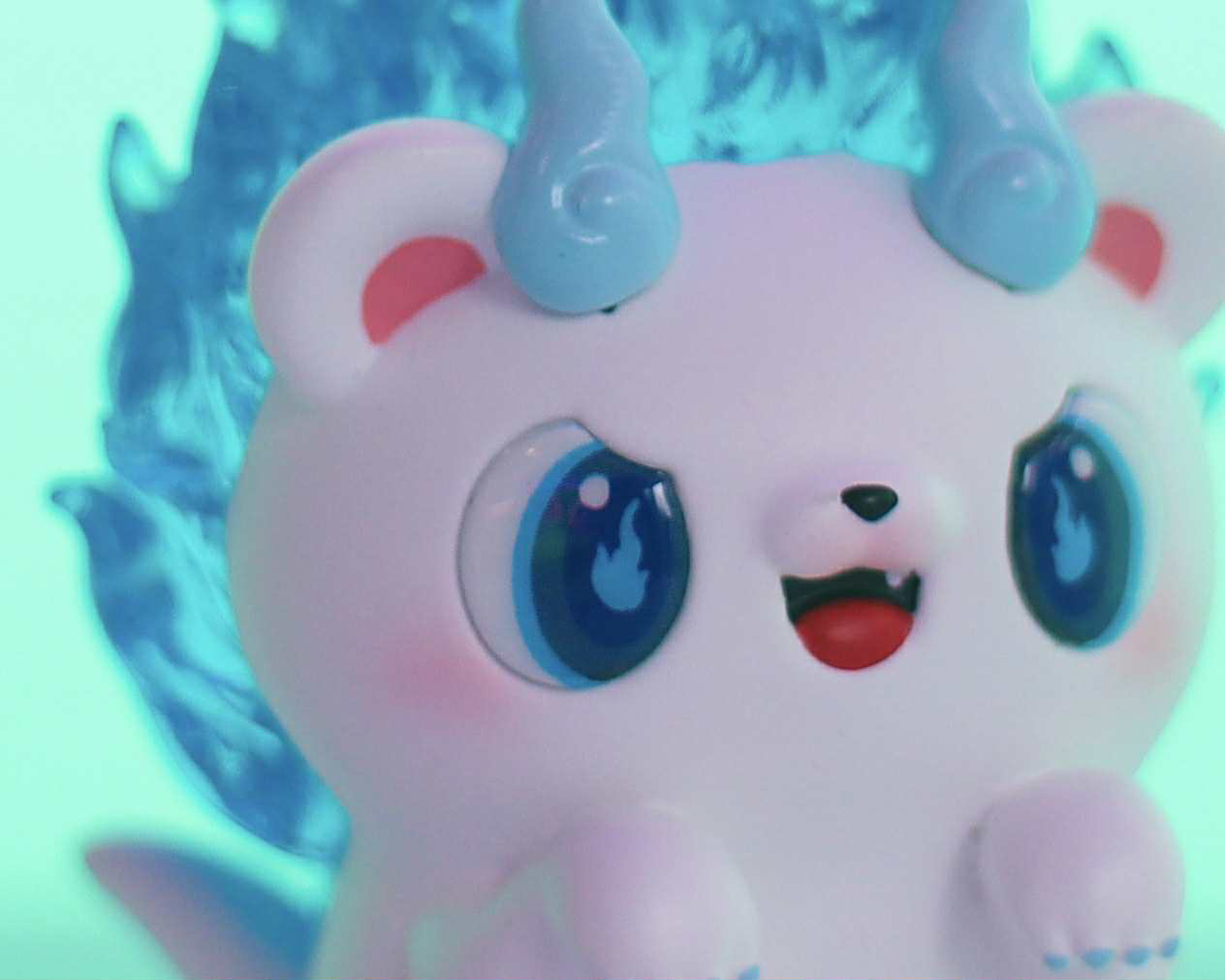 Soul Hogkey Blue Spirit by Tangent, a 9 cm resin toy, features a cute, bear-like creature with blue eyes, turquoise horns, and a flame-like mane. Preorder available.