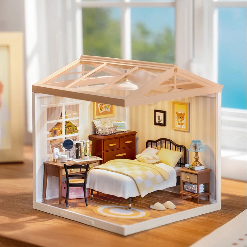 Sweet Dream Bedroom Rolife DIY Miniature House featuring a toy house with a bed, desk, chair, and decorative elements like a cactus picture and teddy bear.