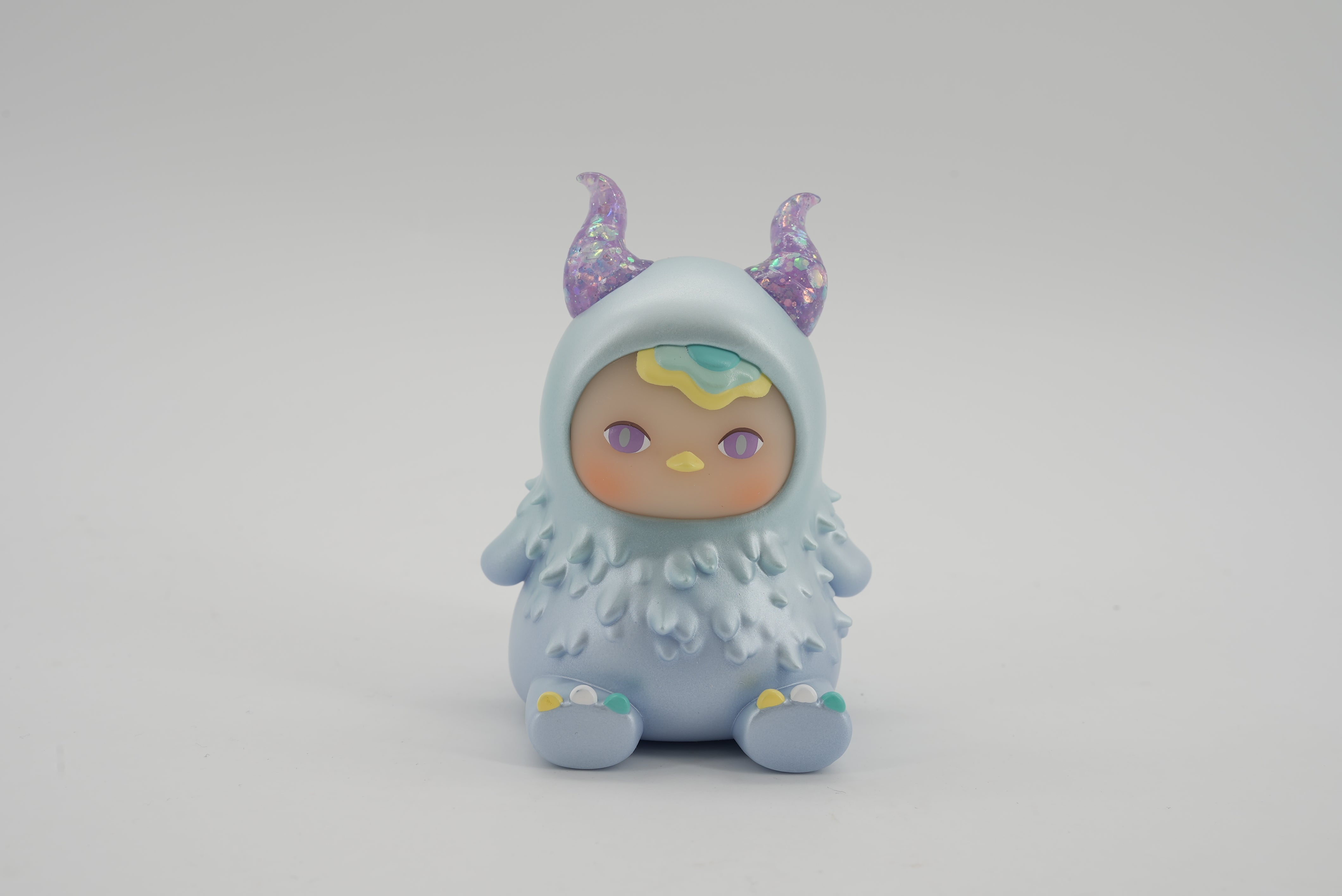 Monster Beanie - Frozen by Pucky vinyl toy figurine with hoodie, horns, and ears, 7.8cm.