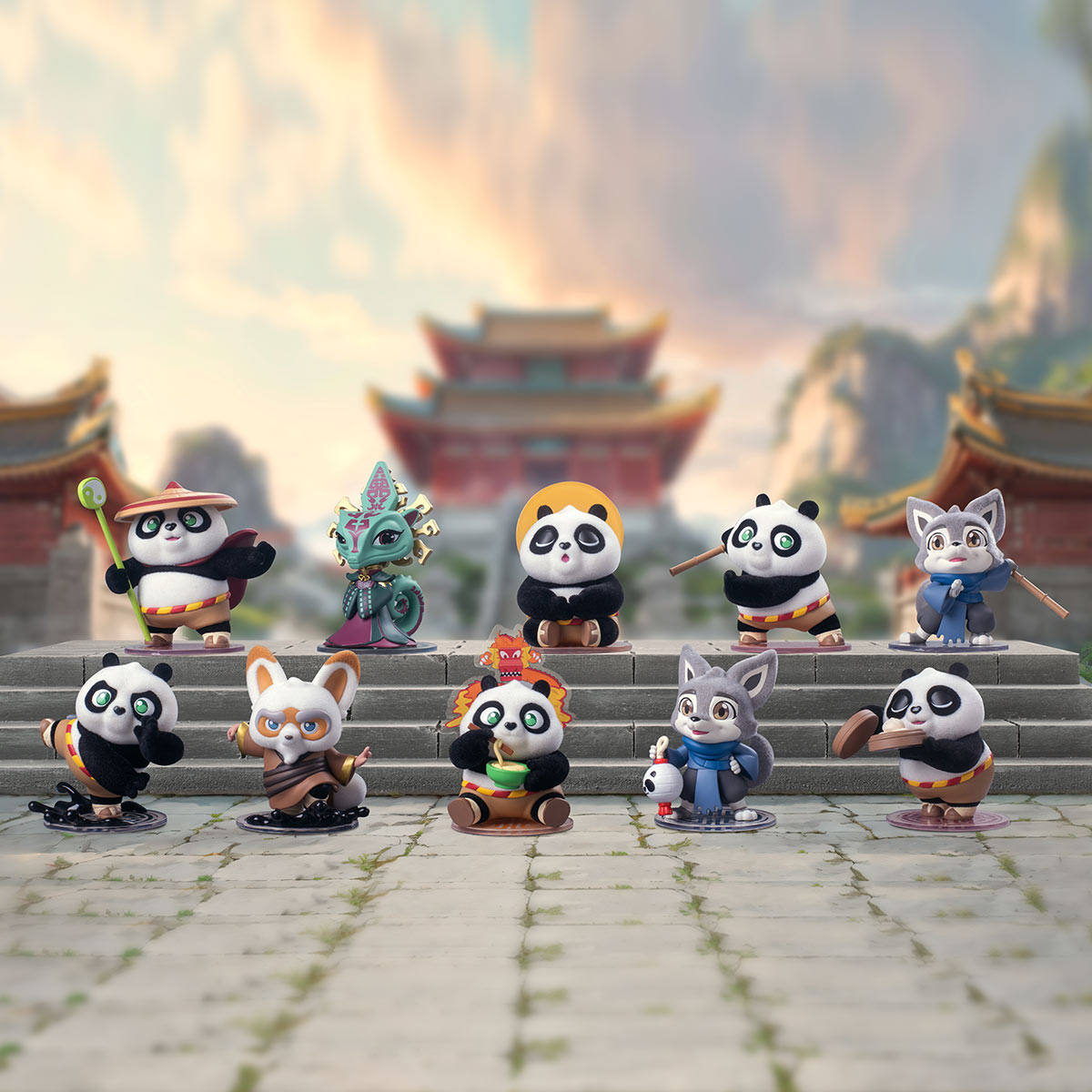 Universal Kung Fu Panda Blind Box Series toys displayed on stairs, featuring various panda figures with accessories, part of the collectible art toy range.