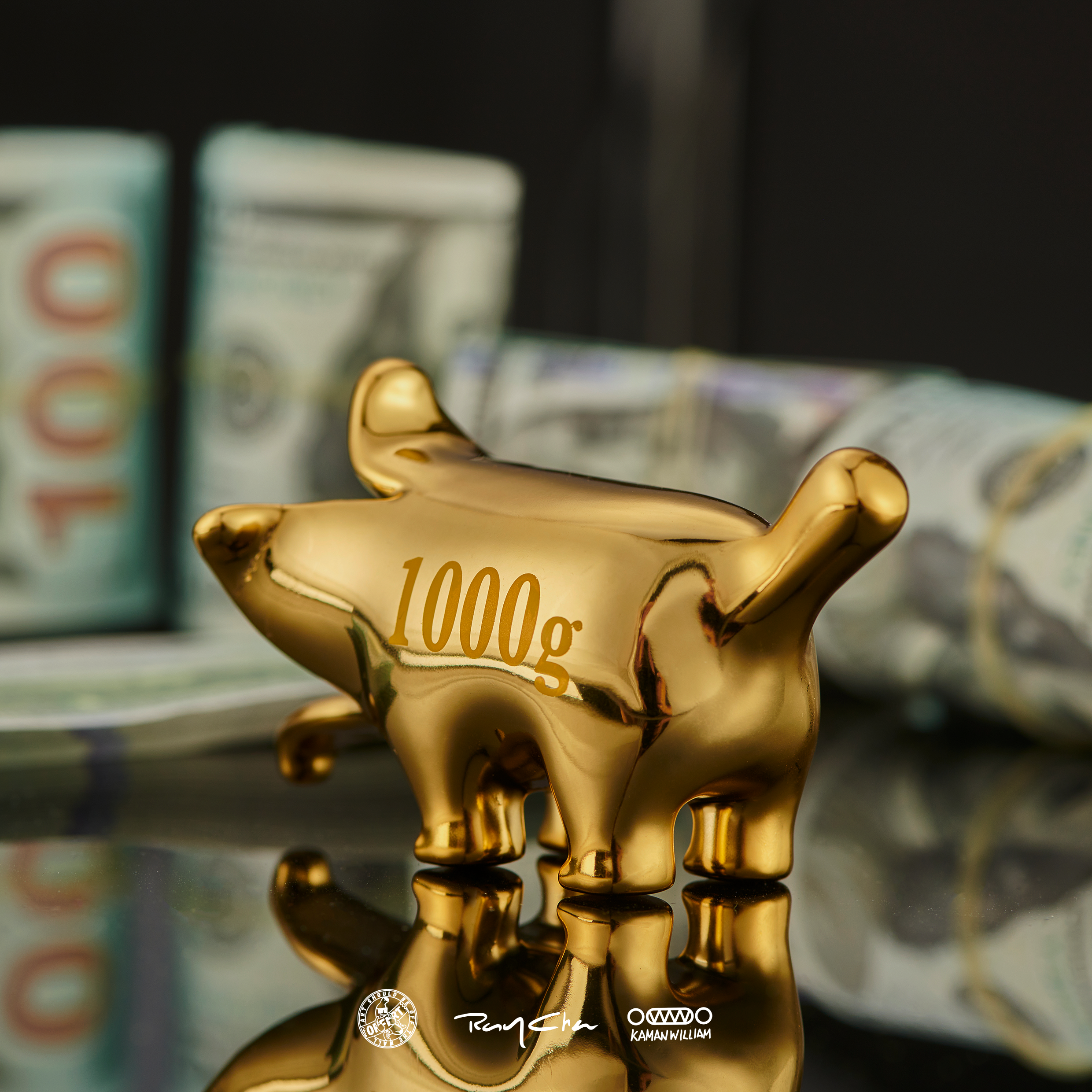 Alt text: OFFART X Kamanwillam Bananaer Dog Mini Gold Edition, a brass toy statue of a dog holding a banana, featuring a magnetically detachable design.