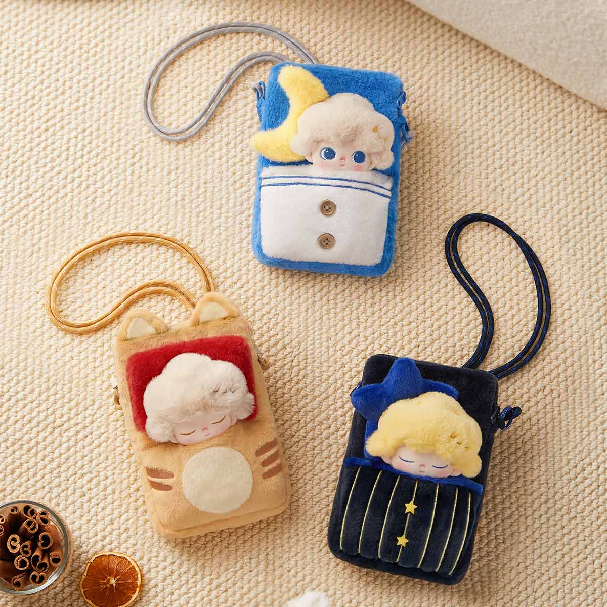 DIMOO Weaving Wonders Series-Quilt Phone Case Blind Box features plush cross-body pouches with themed pockets and doll faces, perfect for collectors.