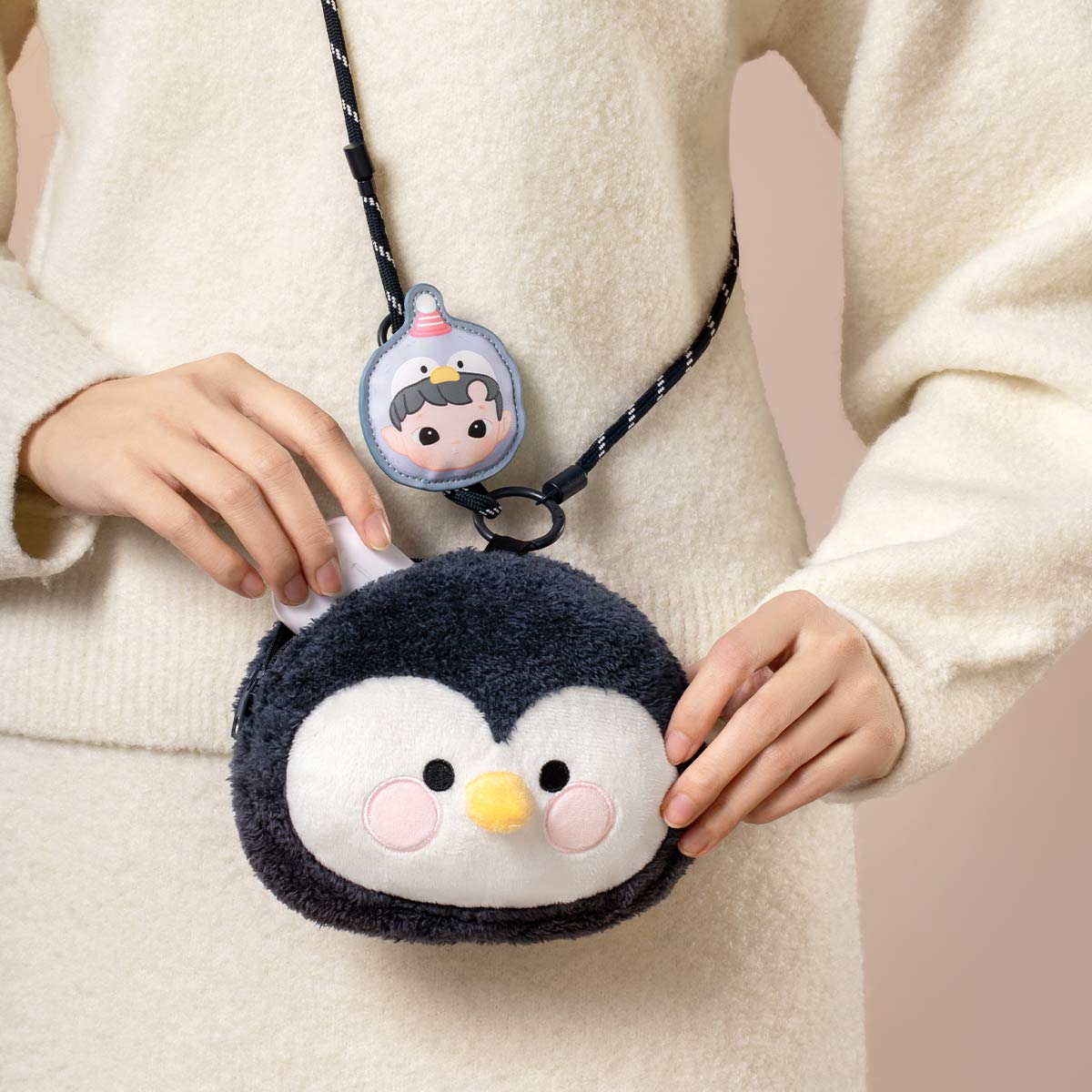 HACIPUPU Snuggle With You Series-Plush Bag Blind Box featuring a penguin-themed pouch and character tag, perfect for carrying small items like wireless earbud cases.
