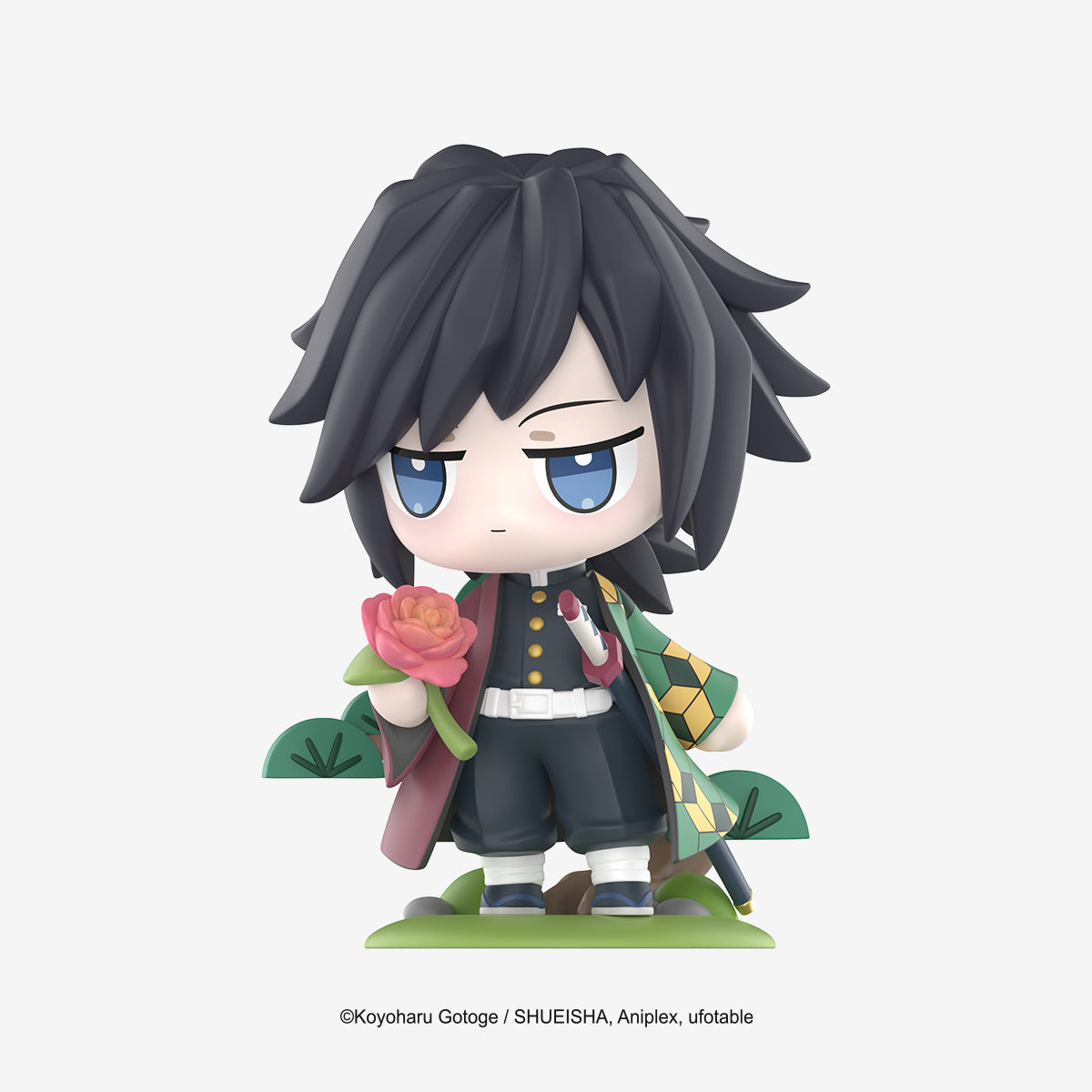 Chibi-style Giyu Tomioka figure from Demon Slayer: Kimetsu no Yaiba Birth Flower Series, holding a rose, part of a collectible 12-design set.