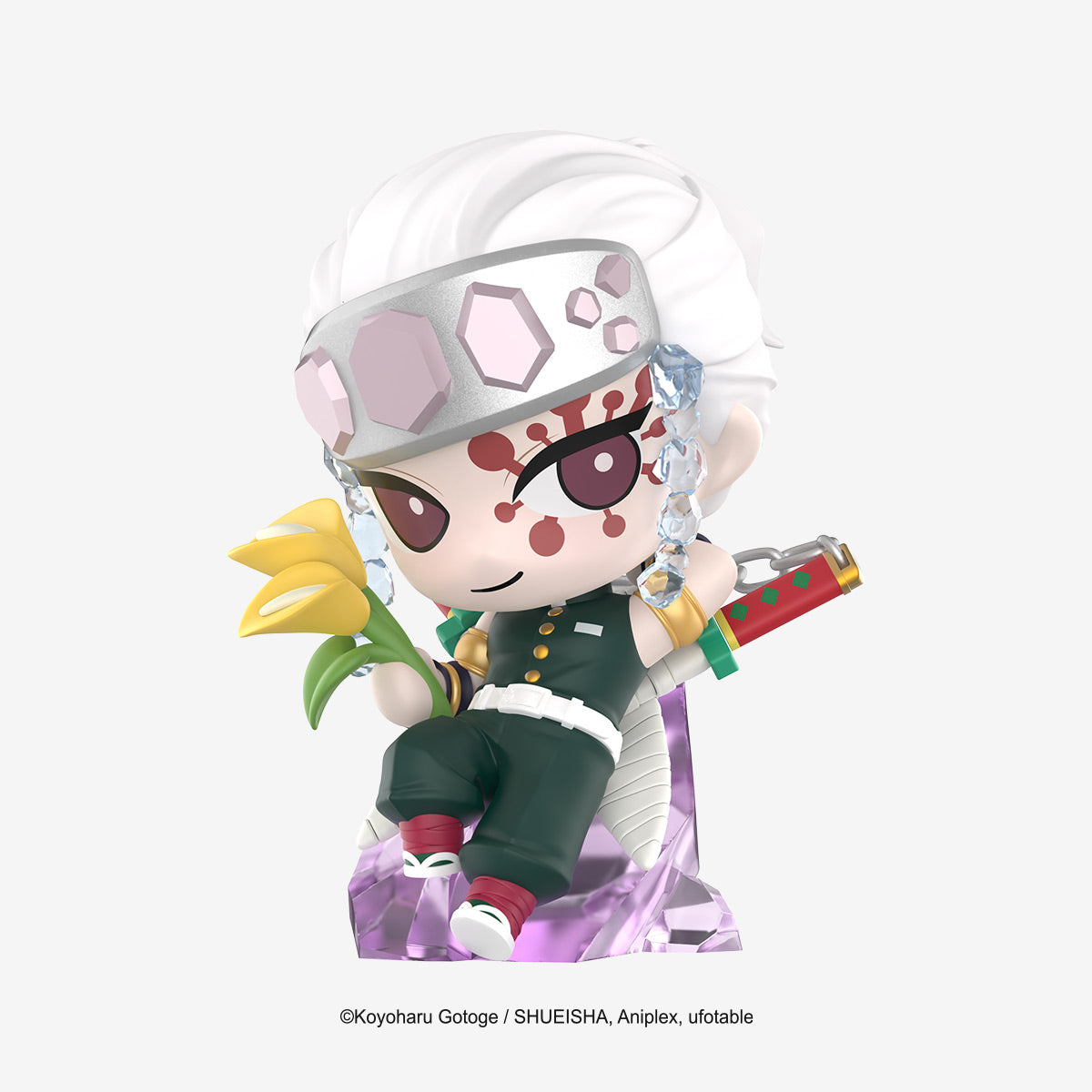 Demon Slayer: Kimetsu no Yaiba Birth Flower Series Figure of Tengen Uzui, chibi-style, seated with tulips, featuring uniform, jeweled headband, earrings, and twin blades.