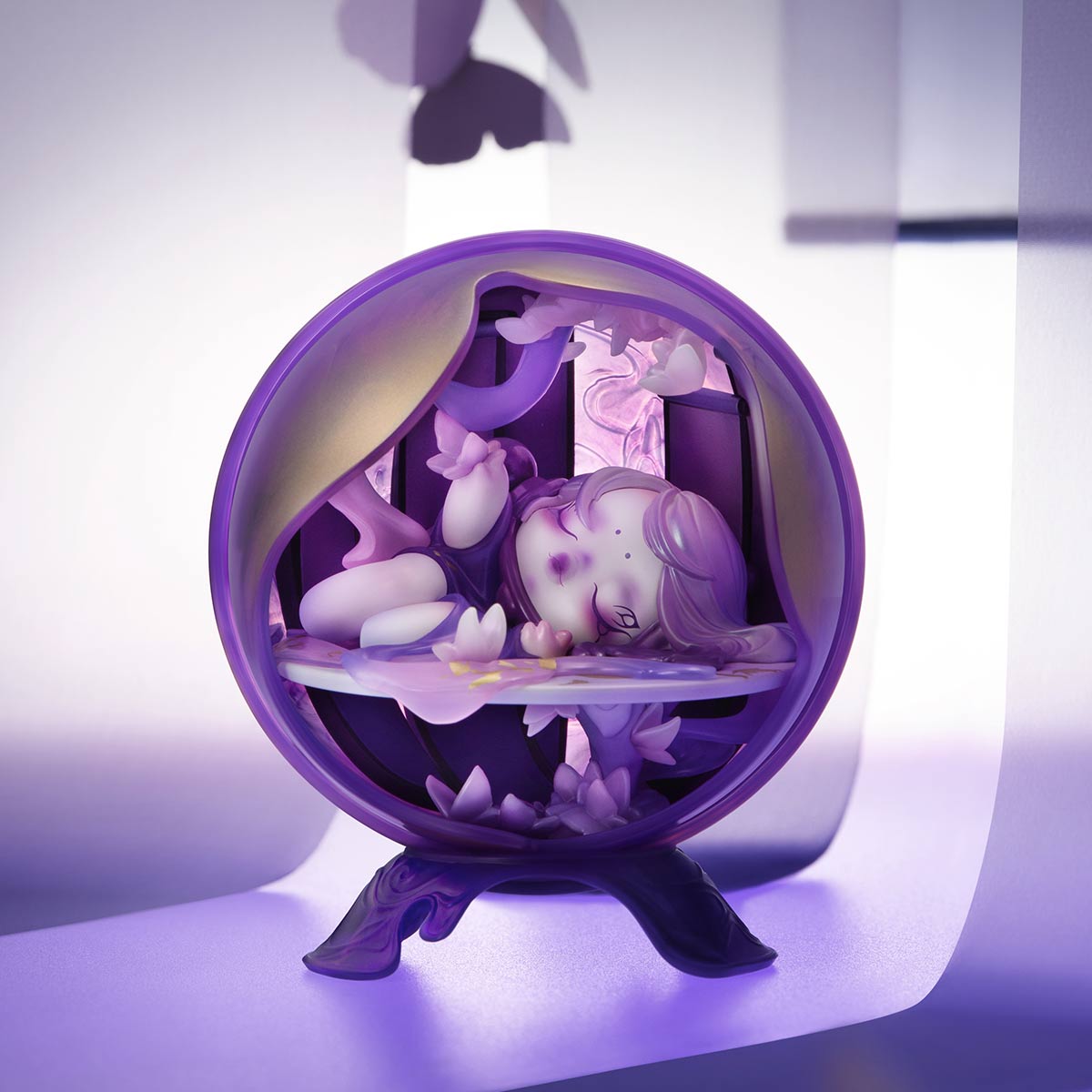 SKULLPANDA The Mirage Series Mini Bag features a purple-themed figurine of a girl sleeping, part of a collectible art toy series.