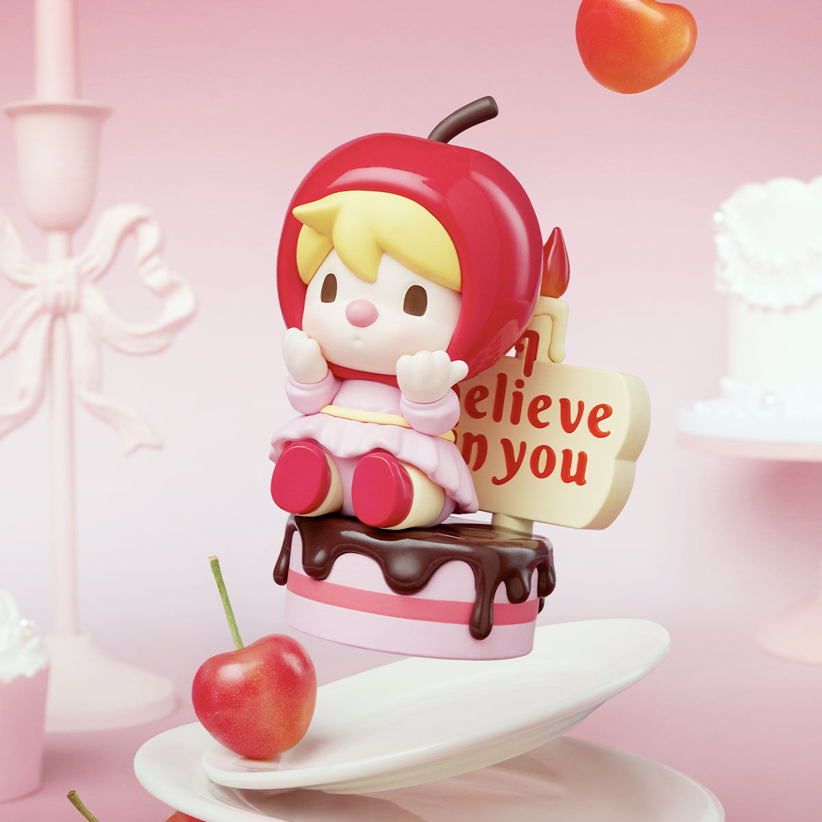 Sweet Bean The Language of Love Series Figures, featuring a toy girl figurine seated on a chocolate cake, part of a collectible blind box set.
