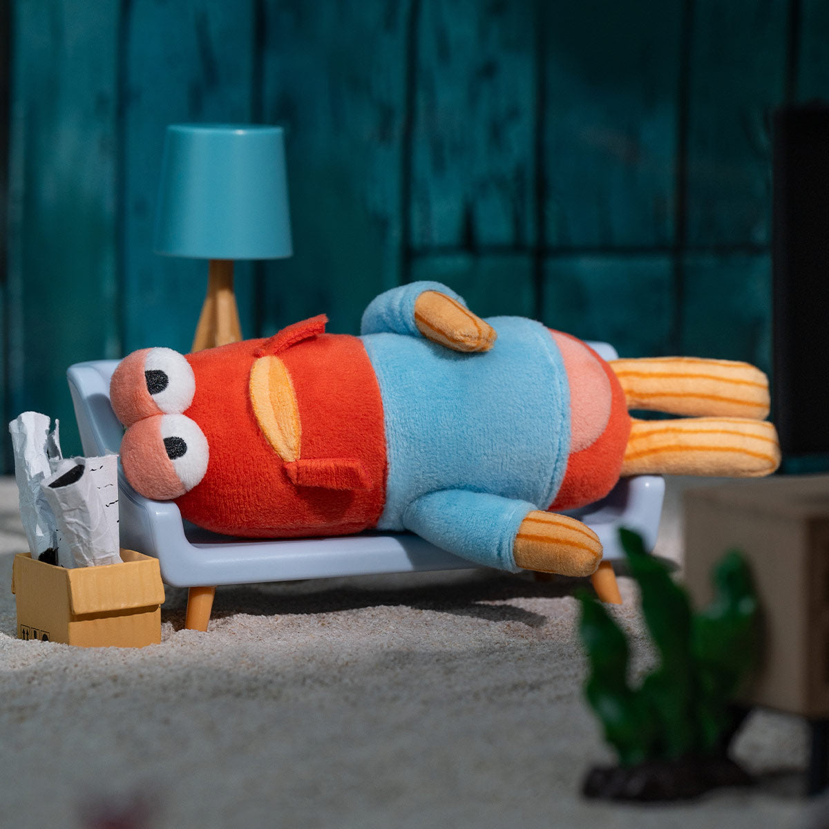 Bikini Bottom Buddies - Whimsical Plush lounges on a miniature couch, part of a collectible series, available for preorder at Strangecat Toys.