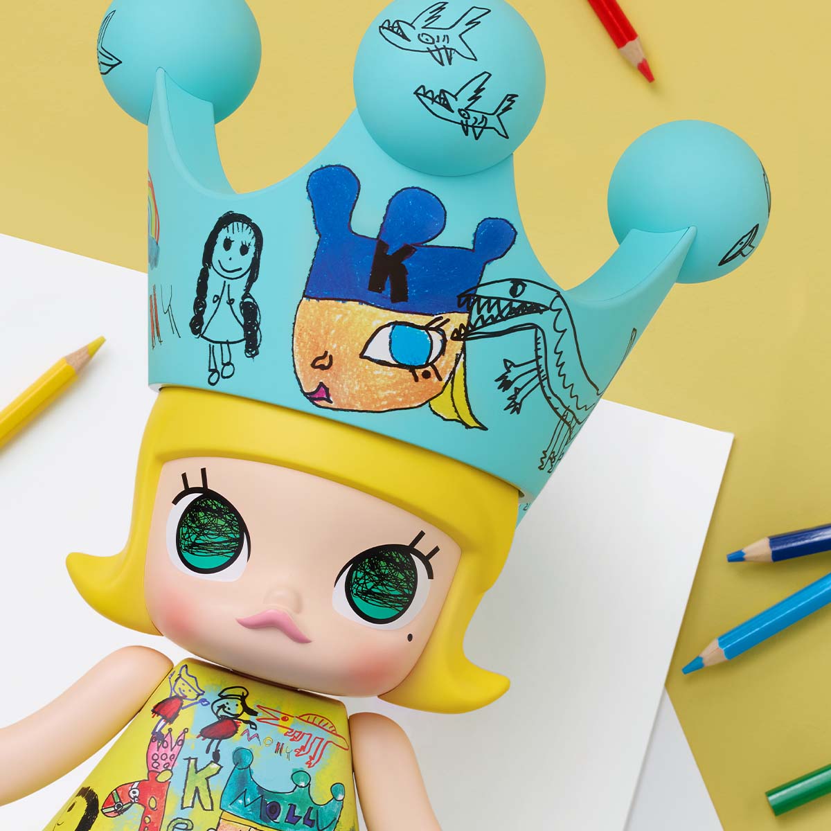 MEGA ROYAL MOLLY 400% Childishness toy with blue crown, showcasing child art and cartoon design. Made of ABS, oversized, 38cm.