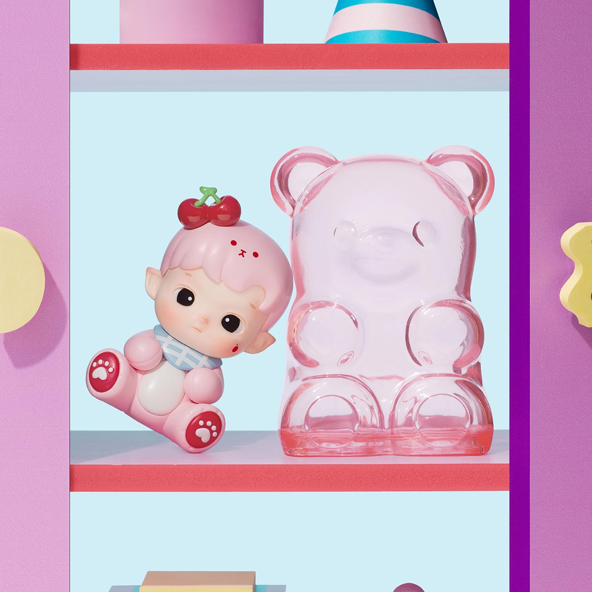 HACIPUPU Rolling Time Machine Series Figures - Preorder features a chubby vinyl toy with cherries and a translucent gummy-bear sculpture.