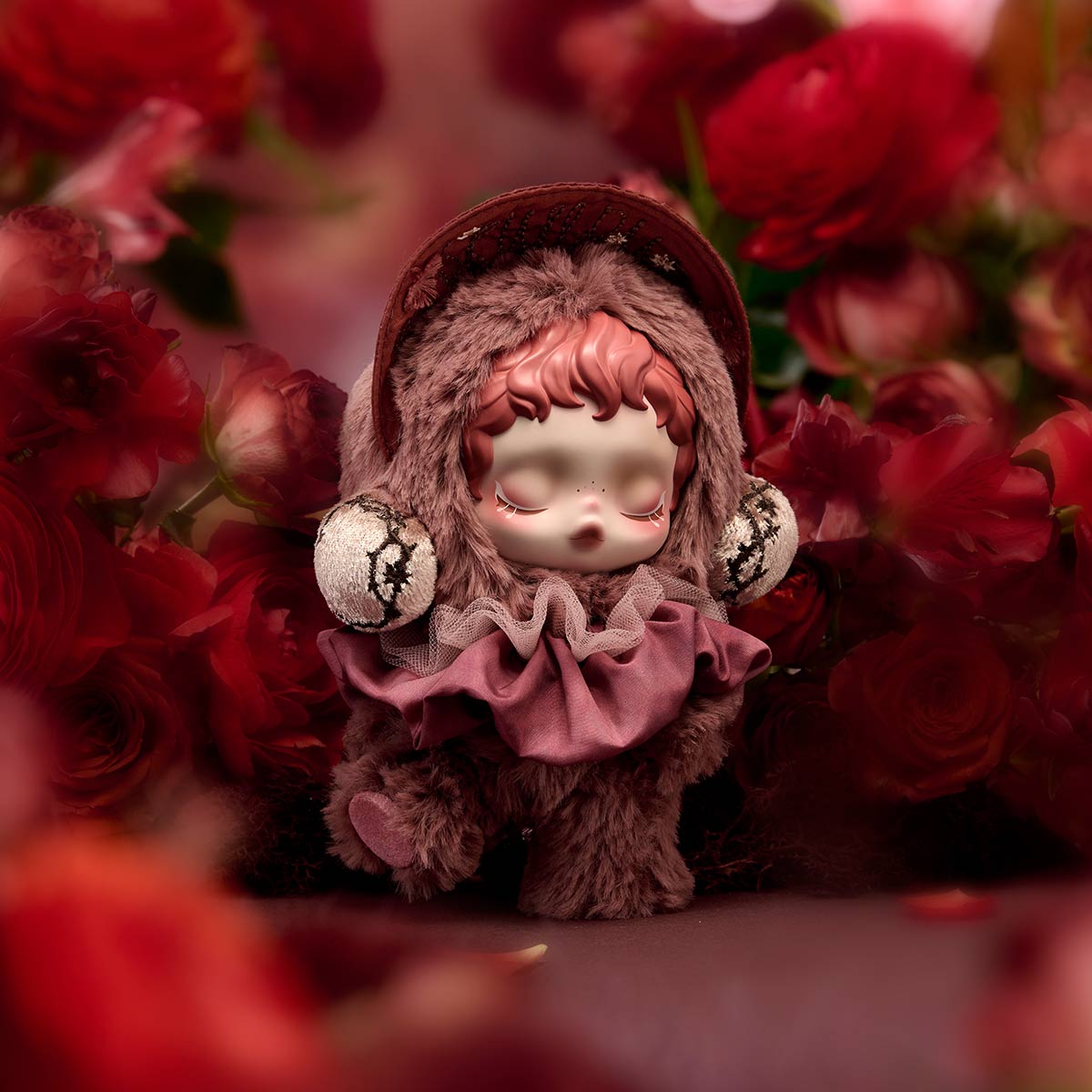 SKULLPANDA L'impressionnisme Series Plush Doll in a teddy-bear costume with earmuffs, posed amidst roses, part of a blind box collection.