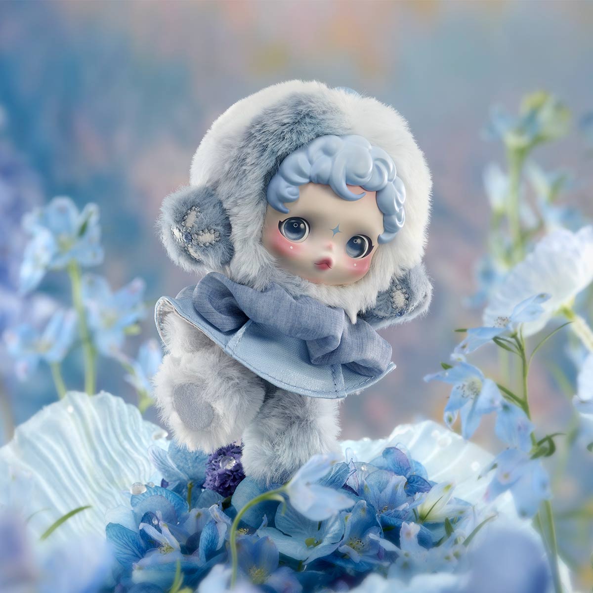 SKULLPANDA L'impressionnisme Series Plush Doll with starry eyes and fur hood, surrounded by blue flowers, reflecting Strangecat Toys' whimsical art toy theme.
