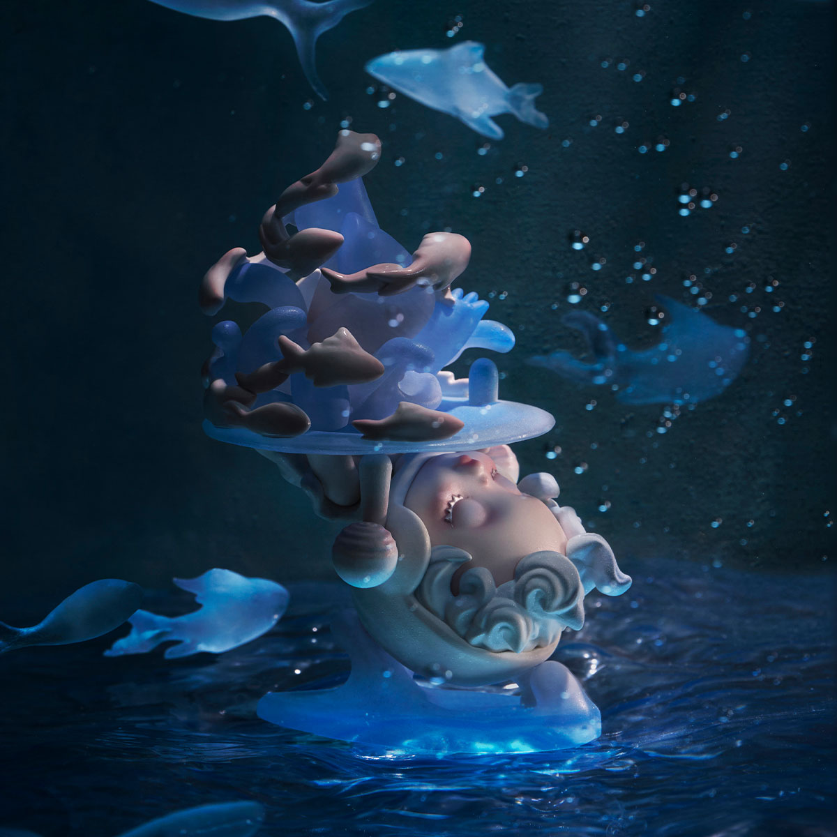 SKULLPANDA The Paradox Series Figure, a surreal 3D sculpture with a sea-blue abstract hat, porcelain-like head, and jellyfish-like fish, available for preorder.