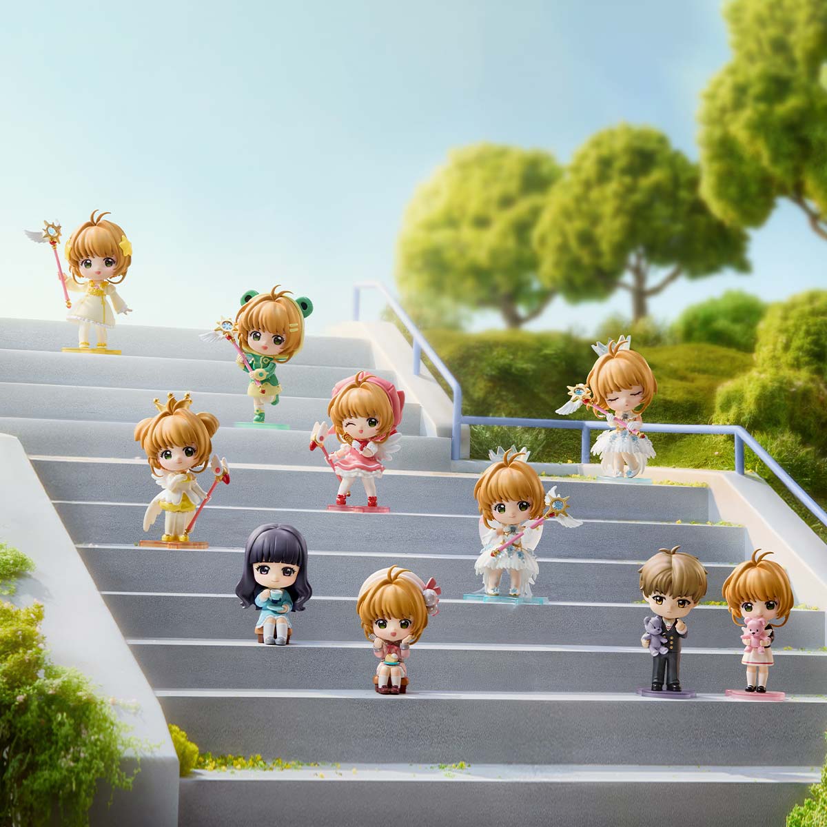 Cardcaptor Sakura: Clear Card Series Figures on steps, showcasing various character outfits and accessories, available for preorder.