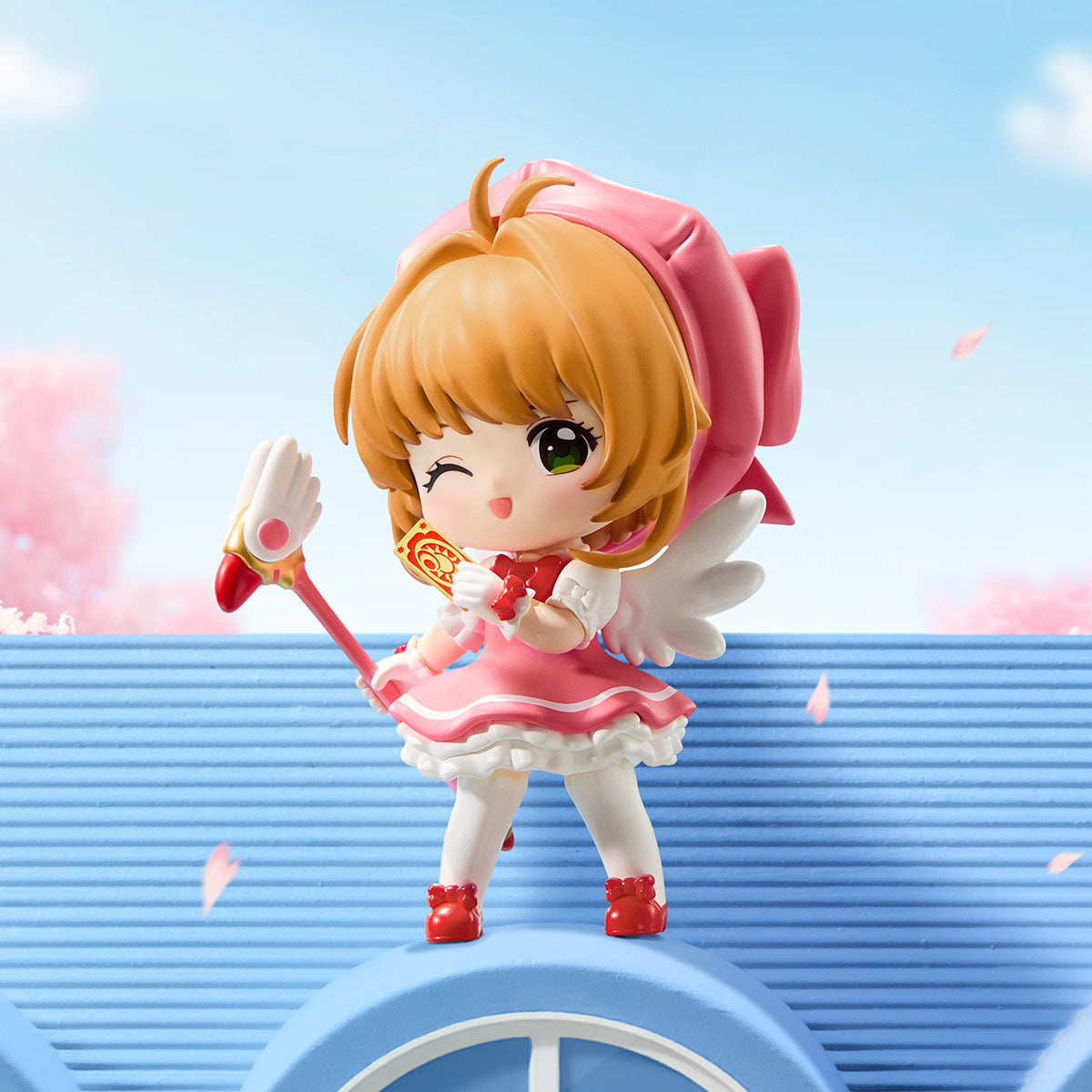 Cardcaptor Sakura: Clear Card Series Figures - Preorder, featuring Sakura in a pink dress with magic staff, Clow Card, and angel wings.