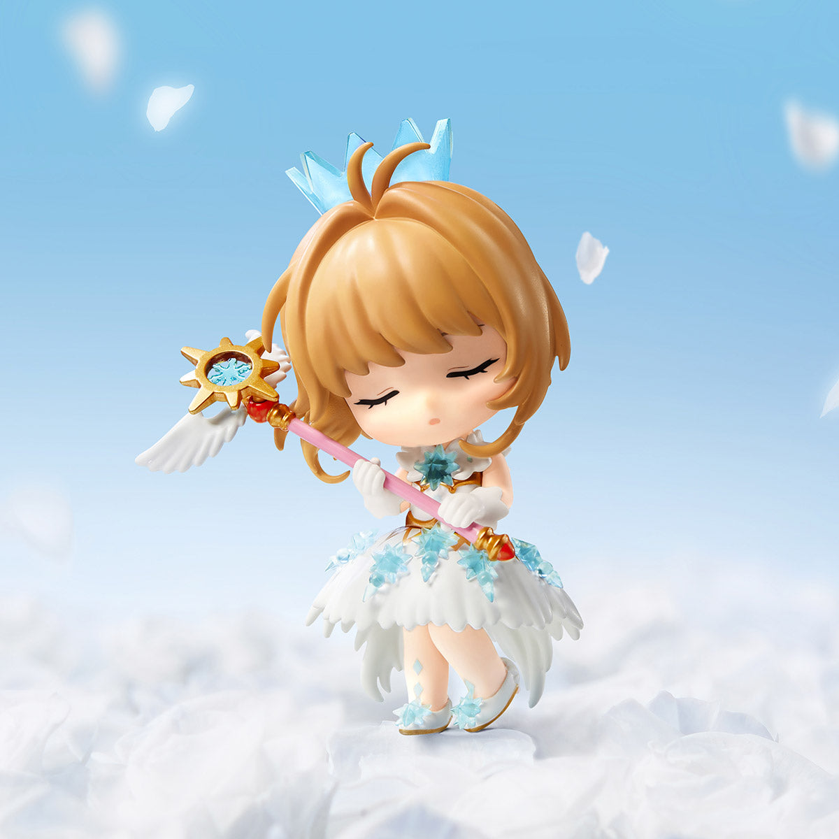 Cardcaptor Sakura: Clear Card Series chibi figurine, preorder, featuring a magical girl with closed eyes, white dress, blue crown, pink staff, and crystal accents.