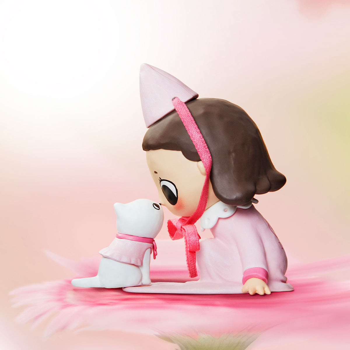 Nyota I Am the Seasons Series figure: a girl in pink dress and hat with a white kitten, available for preorder at Strangecat Toys.