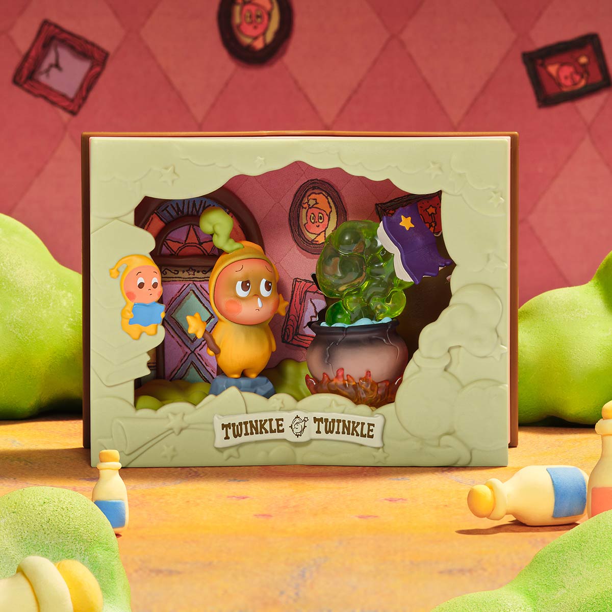 Toy diorama Twinkle Twinkle Light Up Series Scene Sets in pastel-green box, featuring a worried figurine, cauldron, and whimsical backdrop; available for preorder.